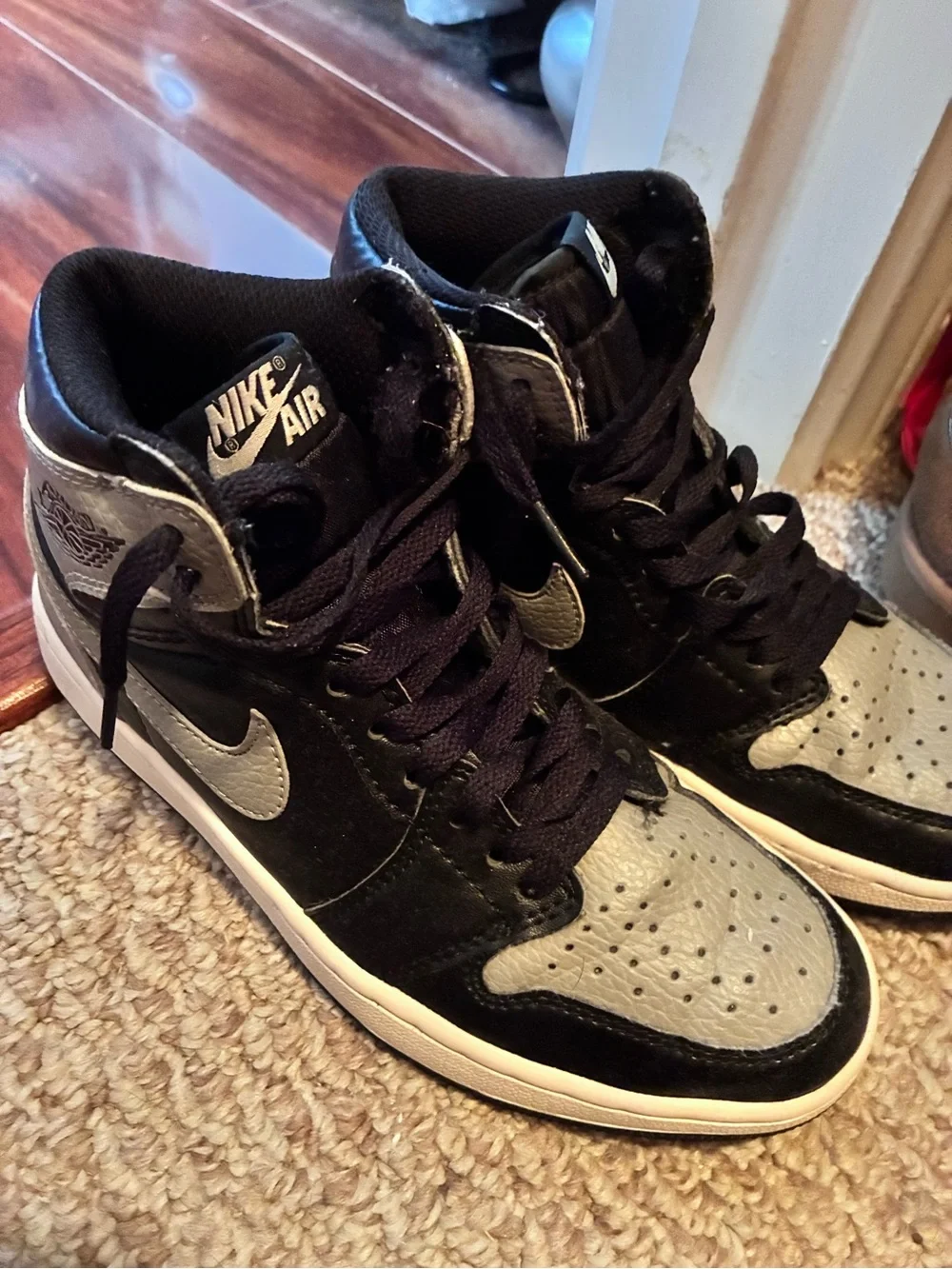 Jordan Women's High-Top Sneakers in Black and Gray